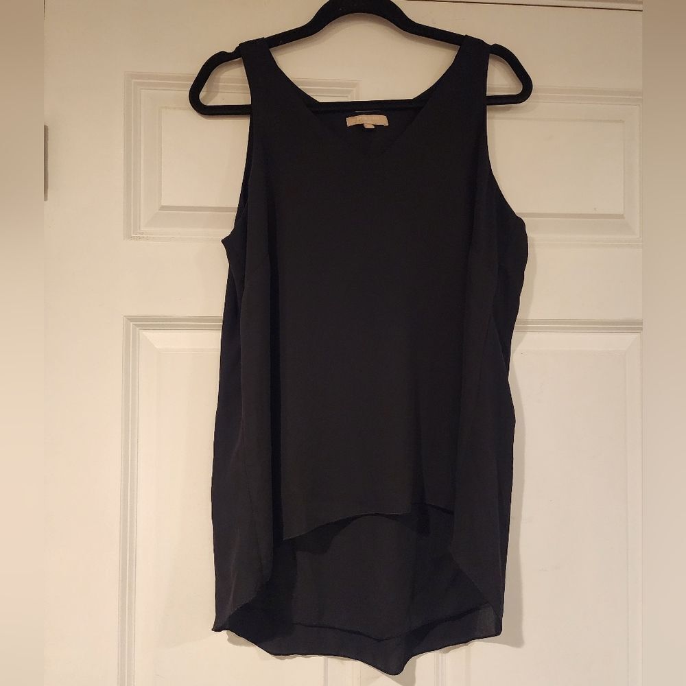 Joann Vass black sleeveless flowey blouse L